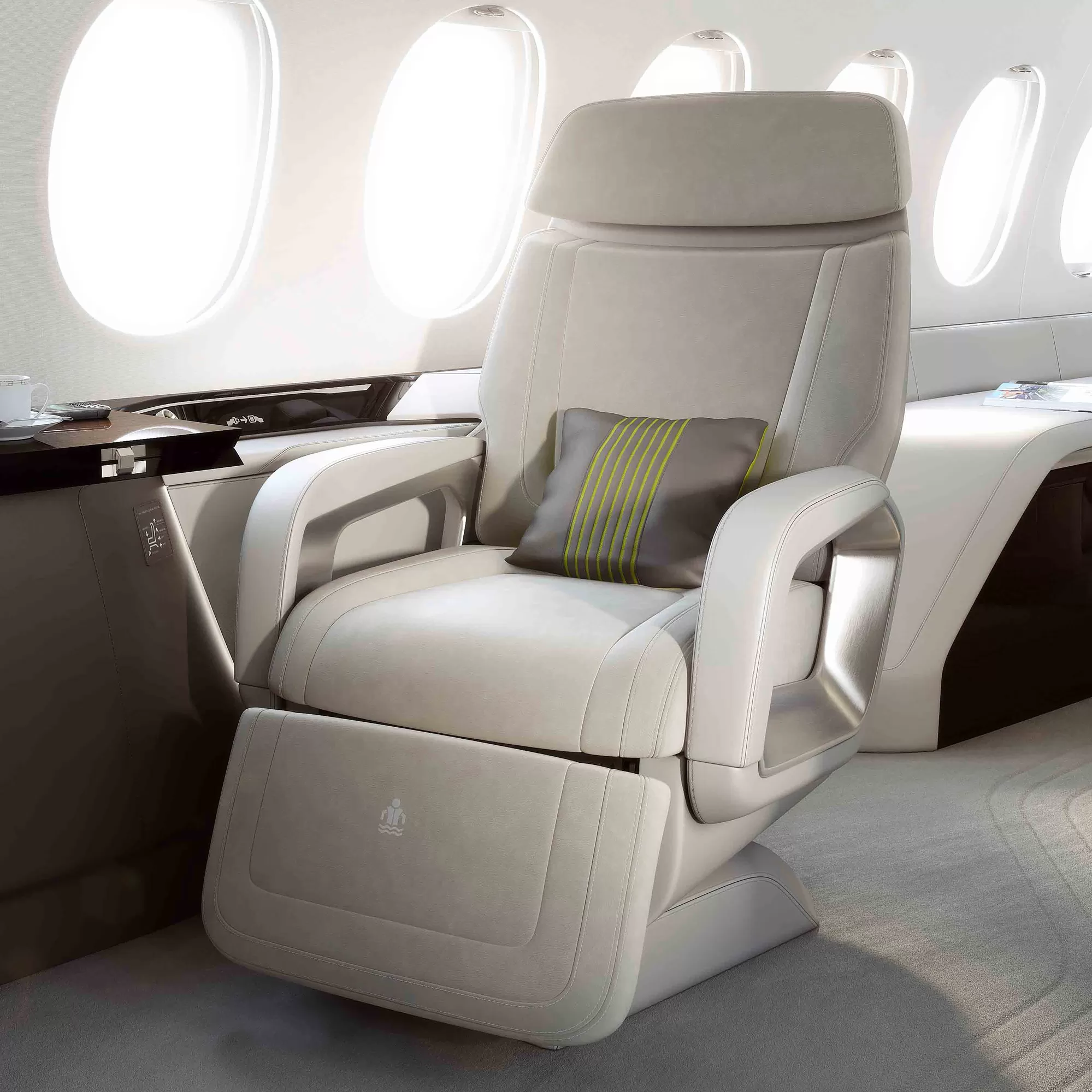 A row of business class seats equipped with comfort features in an airplane.