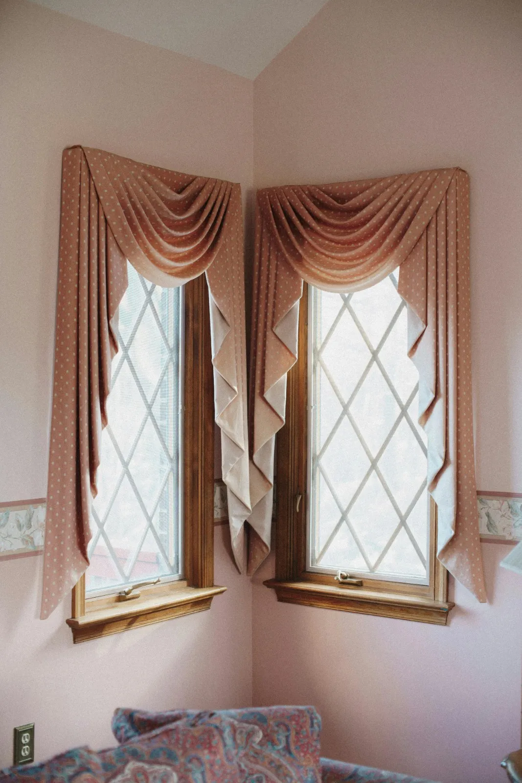 Light and airy American style sheer curtains blowing in a gentle breeze.