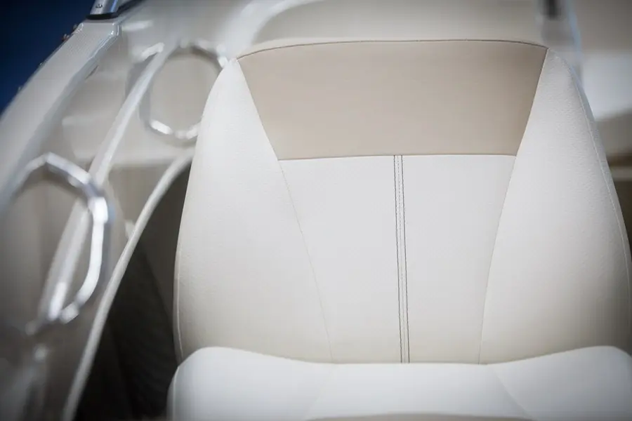 Bright red upholstered seats on a speedboat.