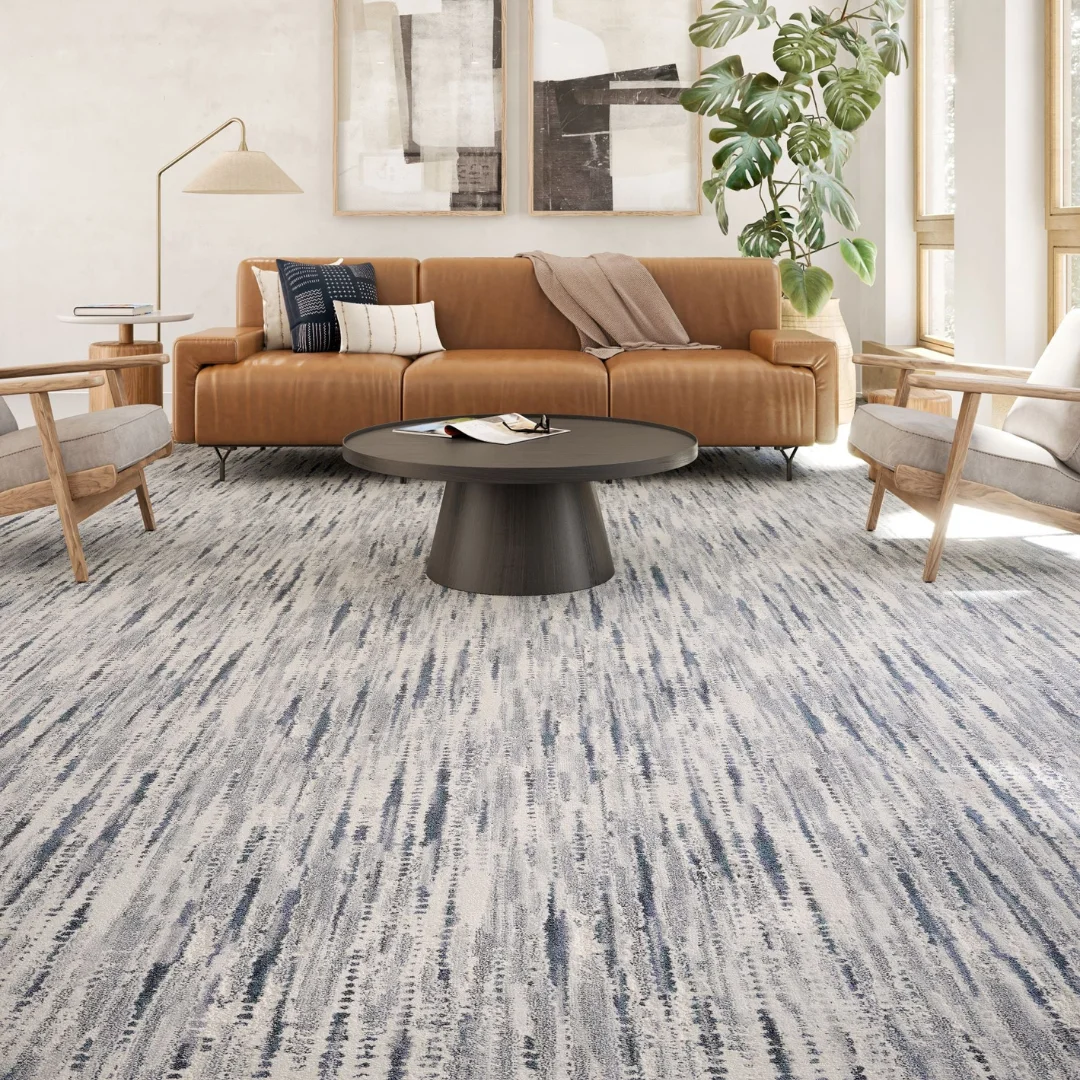 Sound-absorbing carpet square for quieter room environments.