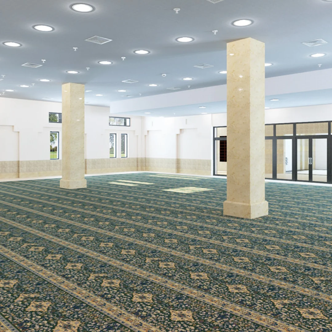 Geometric patterns on a masjid carpet, reflecting Islamic art and architecture.
