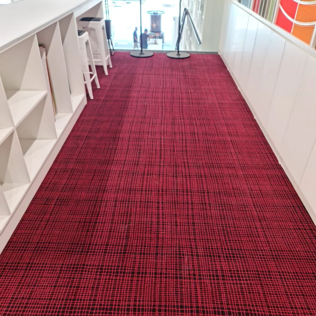 Image of a carpet covering the floor in an office setting