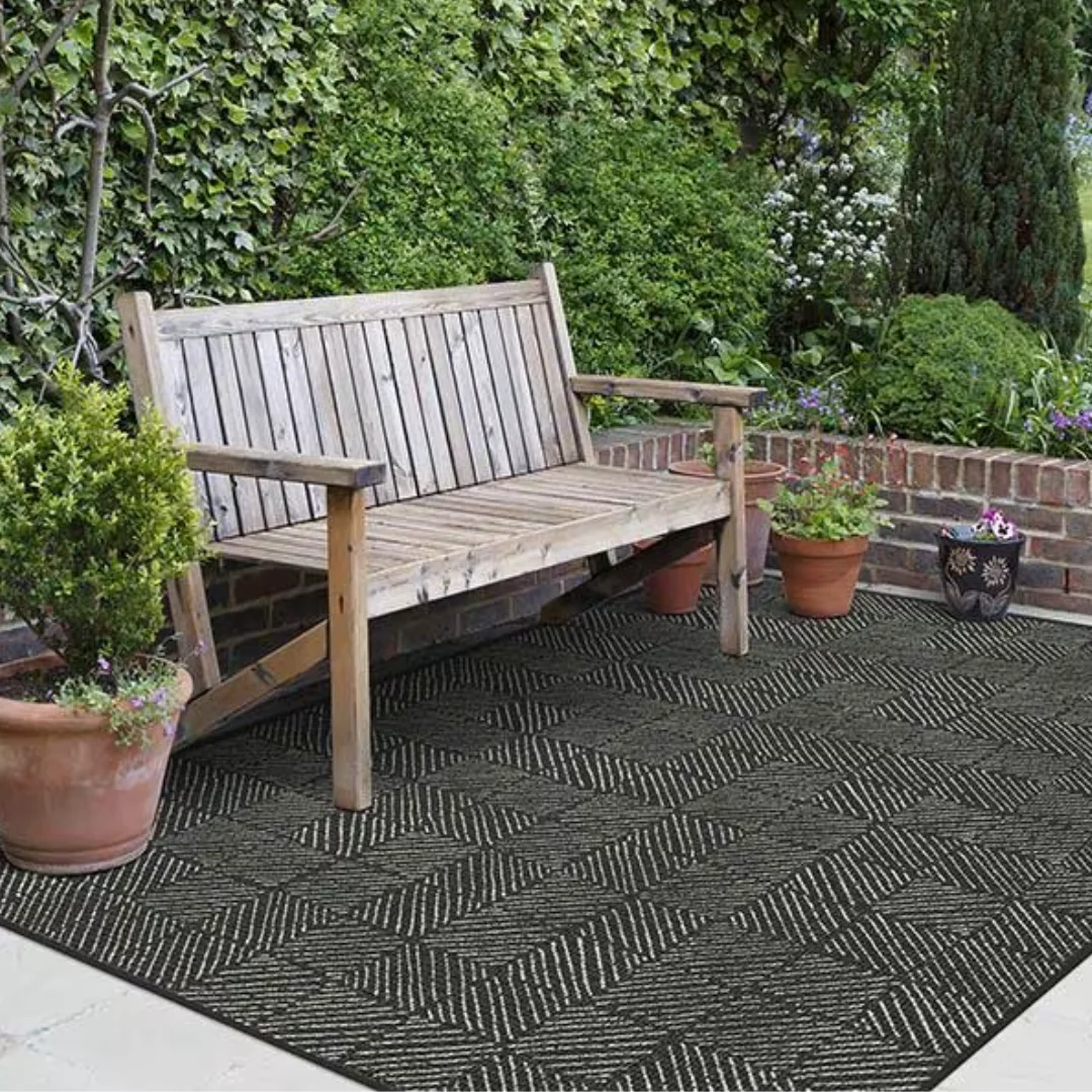 A minimalist design rug outdoors.
